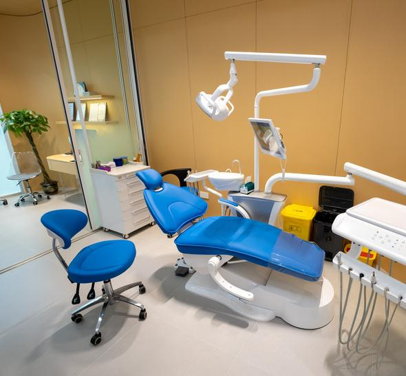 Clinic operatory scene with dental chair equipment